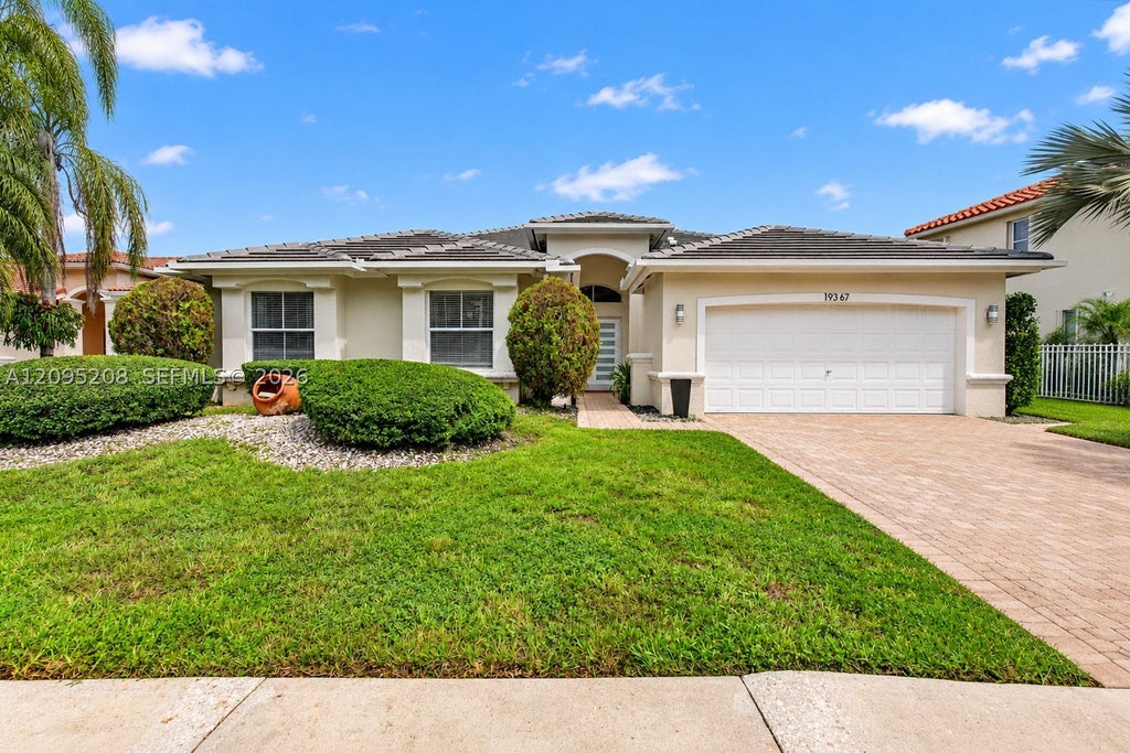 Photo of 19367 NW 23rd St, Pembroke Pines, FL 33029 (MLS # A12095208)