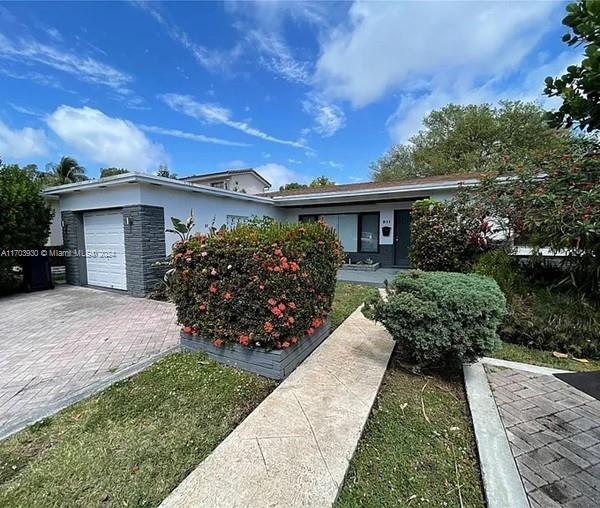 6-8 Month Rental: Beautiful single family home, 1,507 sq. ft., bedrooms, 2 bathrooms. Located in highly desired Normandy Island, Miami Beach. Open concept kitchen and spacious living/dining area. Large Florida room which extends to the expansive backyard facing the Normandy Golf course. Washer & dryer inside the premises. 1 car garage plus 3 additional parking spaces outside.
