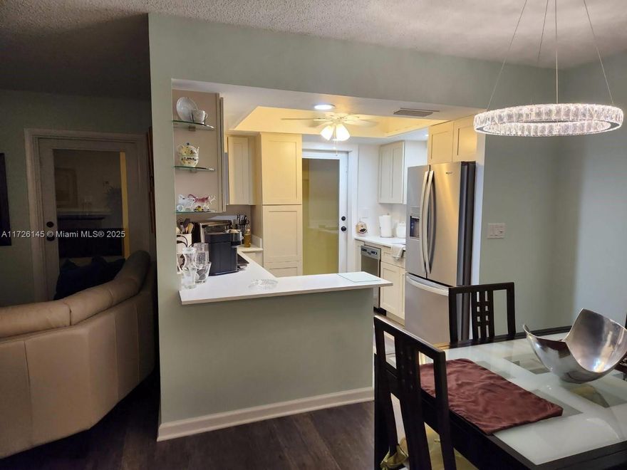 Step Inside this Stunningly Renovated Condo with Impeccable Style!! This CORNER Unit Boasts IMPACT WINDOWS & DOORS and a Unique Floor Plan!!The OPEN Kitchen Features QUARTZ Countertops and a Bar, New Appliances, Flooring! The Bathrooms have been Completely Redone! The Enclosed Patio and Additional Enclosed Area which is part of the patio that you could access from another front door separately Offers Versatile Living Space!! Use as an extra area for a study, playroom or even an overnight guest! Truly a Must See! The Area has Location Location! Quick Access to 595! Best restaurants, Shopping, Top Rated Schools! Contingent on Seller purchasing another home.Seller to pay assessments at closing.