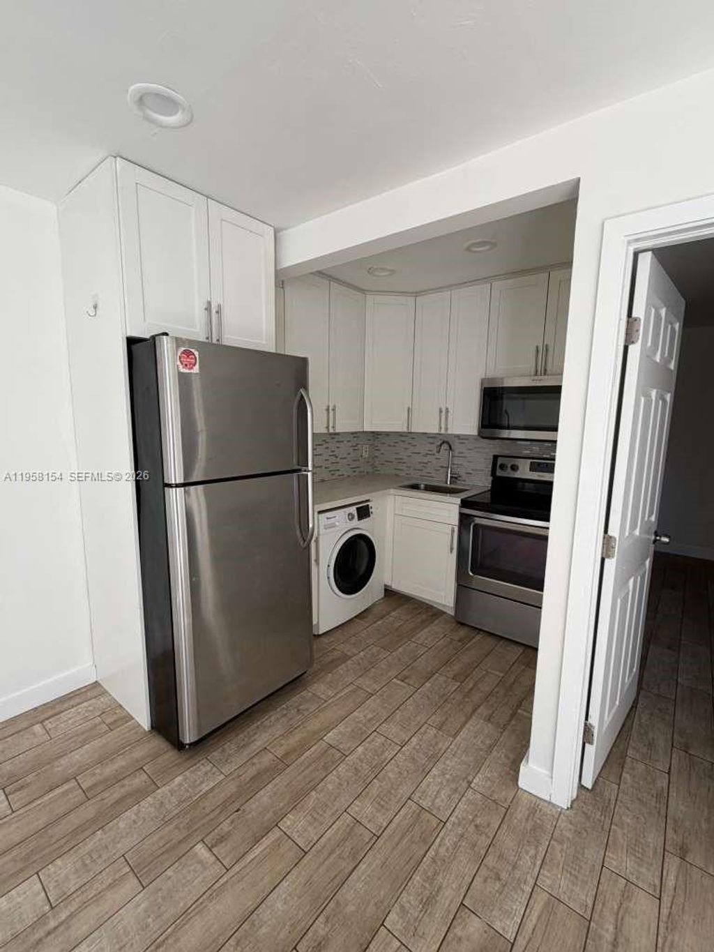 Photo of 5843 Harding St #1-2, Hollywood, FL 33021 (MLS # A11958154)