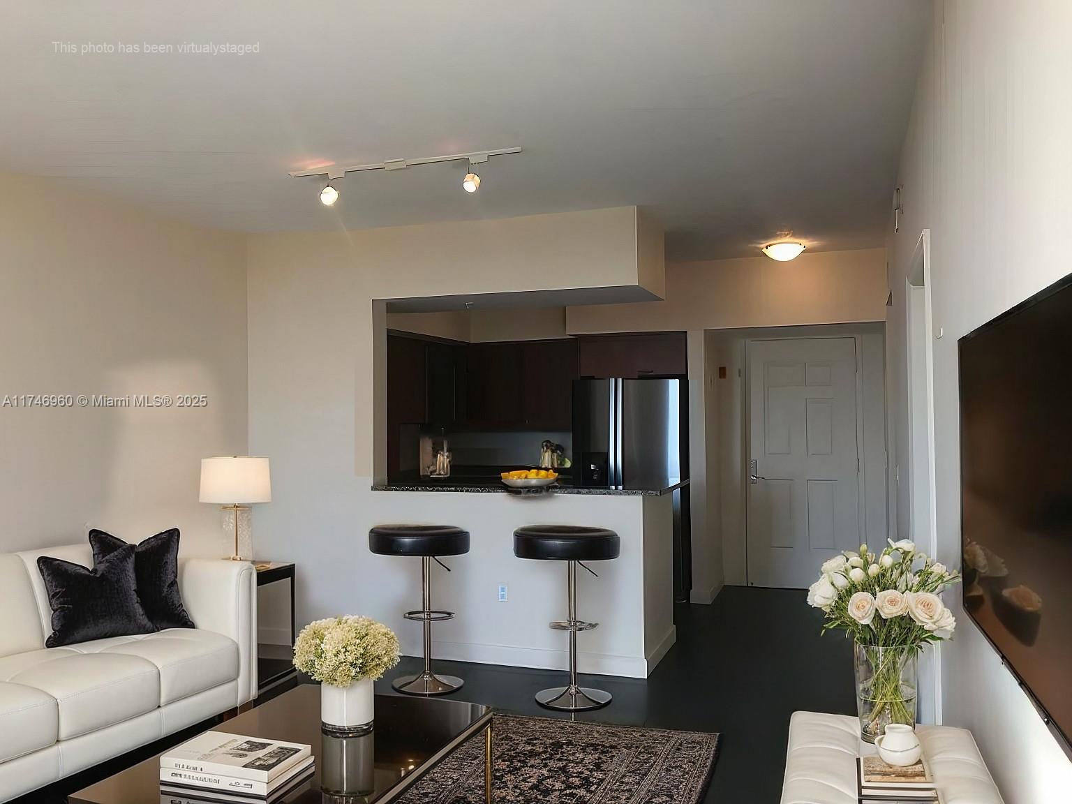 Resort-Style Living in Coral Gables | Investment Opportunity
An absolute GEM in the heart of Coral Gables! This remodeled, high-floor unit in the prestigious Puerta De Palmas offers breathtaking city views from the 15th floor.
A spacious open-concept kitchen with granite countertops, stainless steel appliances, and a convenient breakfast bar.
Enjoy the luxury of a private balcony, in-unit laundry, and TWO assigned side-by-side parking spaces.
Building amenities include a 24/7 concierge, valet & security, a putting green, a resort-style pool, a state-of-the-art fitness center, and more. HOA fees include cable & internet.
Currently tenant-occupied with a lease expiring February 2026—an excellent investment opportunity with immediate rental income.