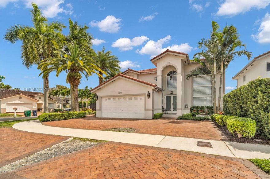 Beautifully remodeled and move-in-ready West Kendall gem! Perfectly positioned on an elevated corner lot, this thoughtfully updated home showcases impact windows, a recently remodeled open kitchen with custom hardwood cabinets and GE Café appliances, upgraded baths, porcelain wood-look tile floors, custom hardwood doors throughout, and new washer & dryer. From the front yard’s modern fountain and lush landscaping to the resort-style backyard, every space is designed to impress with meticulous attention to detail. Enjoy exceptional outdoor living with a full outdoor kitchen featuring a Double Eagle grill, teppanyaki, fridge, pool, Coral Stone terrace with drainage, and sprinkler system with well water. HOA only $128 quarterly.