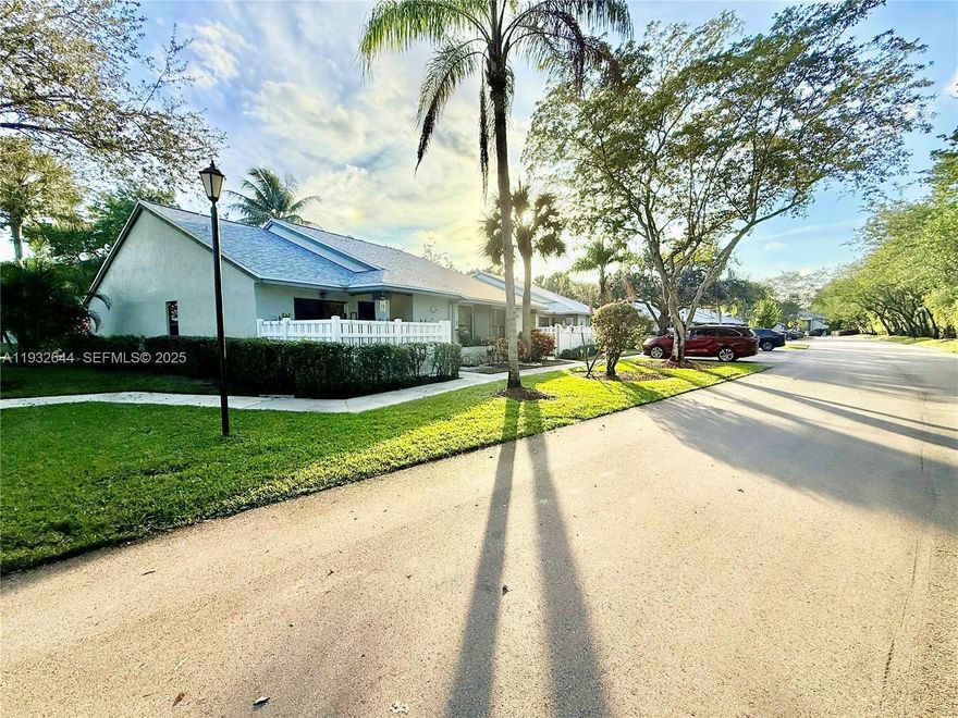 Beautifully maintained, cozy 2BD/2BA corner villa with tranquil water views, located in the highly desirable Township community. This villa offers enhanced privacy and the feel of a single-family home, as it shares only one wall. The inviting, fully remodeled and modernized interior features a bright, open layout with vaulted ceilings and tile flooring throughout.

The updated kitchen offers granite countertops, stainless steel appliances, ample cabinetry, and sliding doors leading to a charming front courtyard. The primary suite overlooks the patio and lake and includes a walk-in closet and a renovated en-suite bathroom with dual sinks, a modern vanity, and a frameless glass shower.

Additional highlights include a very spacious, fully renovated attic offering exceptional storage space, a full-size washer and dryer, and an enclosed patio. The well-maintained community features a pool, and residents also enjoy access to The Township’s resort-style amenities, including an Olympic-size pool, tennis, basketball and volleyball courts, a fitness center, theater, billiards, ping pong, and scenic walking paths around the lake.