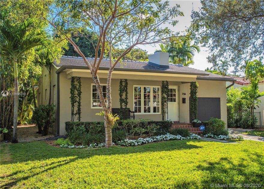 This lovely home will inspire and delight from its beautiful tropical large lot to the charm of the hardwood floors, fireplace, extensive moldings and custom finishes throughout.  New roof, impact glass, gorgeous updated kitchen and bath. This home has style, and curb appeal galore.  Oversized 7350’ lot has an absolutely breathtaking private backyard with a charming covered porch. Plenty of room for a pool or future expansion. This is a one of a kind, immaculate, turnkey, stunning special home.