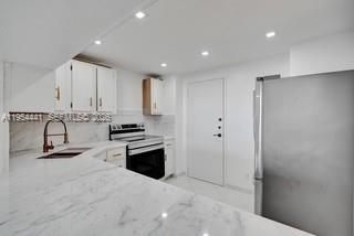 PRINCE GEORGE ARMS CONDO - Residential