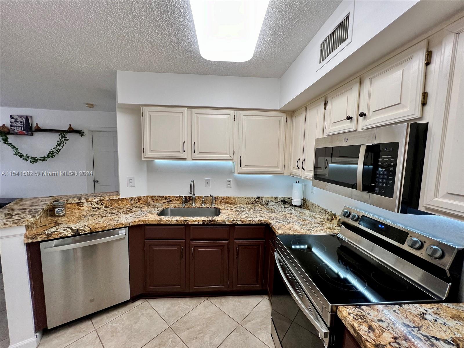 UNIVERSITY INN CONDO - Residential