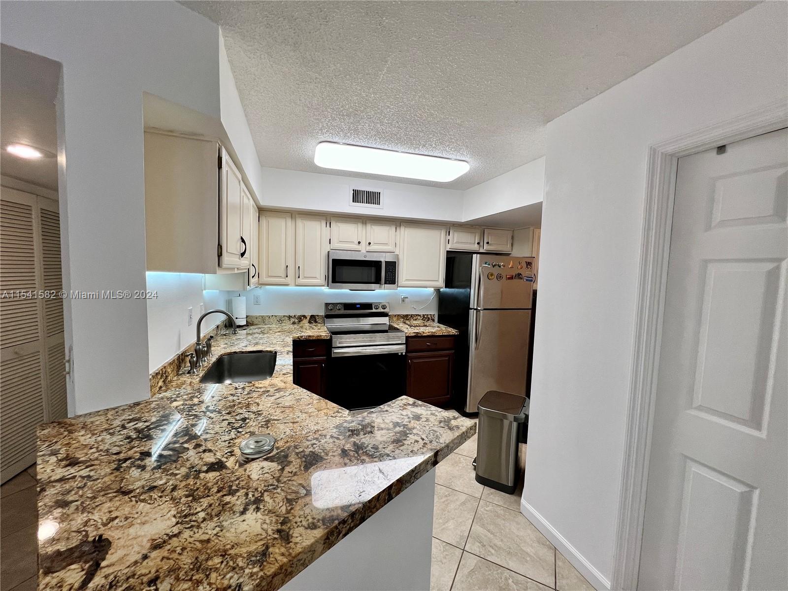 UNIVERSITY INN CONDO - Residential
