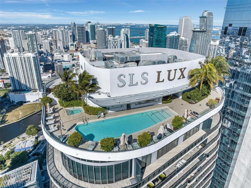 SLS Lux 2bedroom/2bath fully furnished and professionally decorated condo in the heart of Brickell offered for lease and for sale!  Unit offers wrap around balcony, wood like tile floors, marble bathrooms, quartz counter tops , custom cabinetry, top of the line appliances, Nest A/C & smart extra large TV screen. Building offers sky lounge, pool with bar & cabanas, state if the art fitness center, full service spa, bar & lounge, business center and 24 hour concierge, security & valet. Located just steps from Brickell City Centre, Merry Brickell Village, world-class dining, luxury shopping, and vibrant nightlife, this is your opportunity to live at the epicenter of Miami’s most dynamic neighborhood.
This fully equipped residence offers a modern, turn-key lifestyle. The private elevator opens to an vibran, light-filled residence with sweeping panoramic city views. The spacious primary suite features a luxurious en-suite bath, while the second bedroom provides comfort and versatility. Enjoy world-class amenities including an infinity and heated pool, rooftop deck with BBQ area, state-of-the-art gym, steam room, hot tub, basketball and tennis courts, kids play room, and much more.