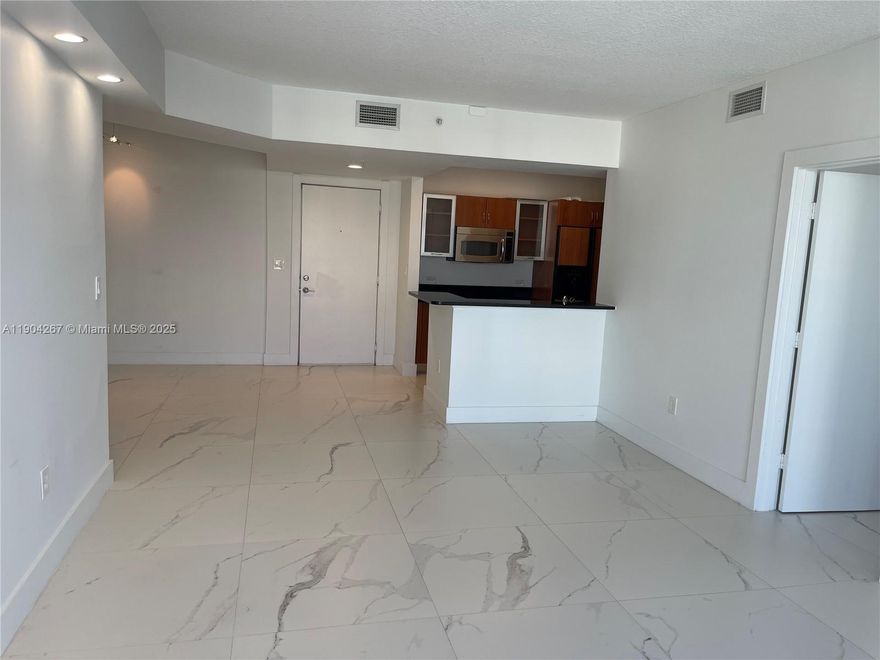 WHITE AND GRAY PORCELAIN FLOORS THROUGHOUT this pool facing 2Bed/2Bath condo located in the heart of Aventura. freshly painted, lighting soffit, Window treatments and custom closets. Washer and Dryer inside unit..... Hurricane impact windows and doors......... Amazing amenities in building with 24 hours security, covered self parking, Water, Valet, Cable TV, Wifi and Internet included in the rent. Building has a Business center, infinity pools, sauna, gym, clubroom, billiard room, movie theater and much more. Only steps away from supermarket, stores, and restaurants. Near Aventura Mall, Hospital and Beaches. Courtesy Aventura Freebee & Shuttler Buses....... Aventura A+ SCHOOLS.........