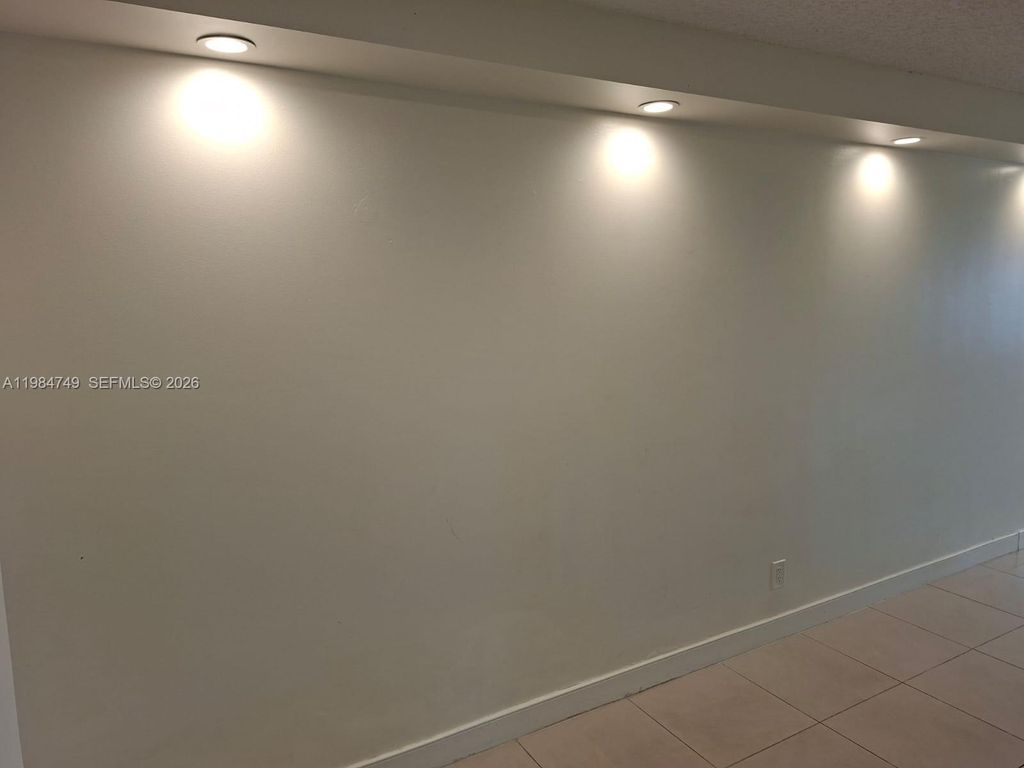 Photo of 301 Golden Isles Dr #110, Hallandale Beach, FL 33009 (MLS # A11984749)