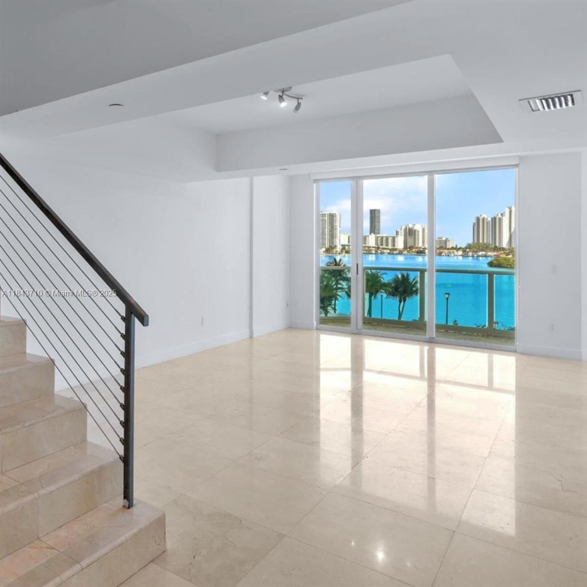 Welcome to 508 in one of Aventura’s most coveted addresses. 2-bed + den, 2.5-bath two level condo spans over 2,000 SF and boasts great views of the Intracoastal and pool grounds. The open kitchen with top-tier appliances and granite countertops is perfect for entertaining. A flexible den upstairs is ideal as an office, media or 3rd room. The Peninsula II delivers a five-star lifestyle - amenities include two state-of-the-art fitness centers, spa and sauna, tennis courts, multiple pools, children’s playroom, business center, valet, and 24-hour security. Ideally located in the heart of Aventura—just minutes from world-class shopping at Aventura Mall, premier dining, top-rated schools, Sunny Isles Beach and major highways—Residence 508 offers the perfect balance of convenience and luxury.