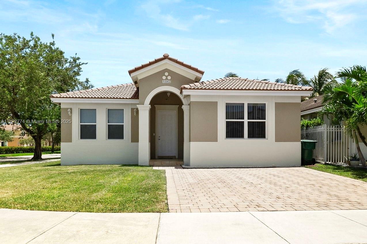 Beautifully updated 3 bedroom, 2 bathroom home with lake views. Located near exit 9, just less than 5 minutes away from the Turnpike, supermarkets, parks, and shopping centers. This home features a remodeled kitchen with brand-new appliances, quartz countertops, and modern cabinetry. New bathroom vanities and fixtures, one bathroom has been fully remodeled with a shower. Enjoy stunning sunset lake views. This home also features impact windows, fresh interior and exterior paint, and a very convenient storage room on the backyard. Ready to move-in!