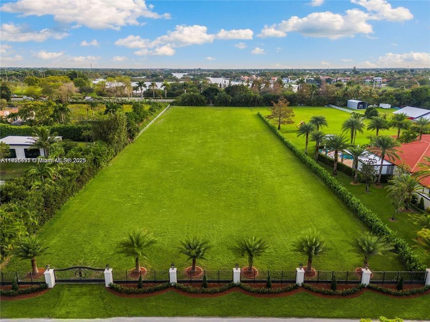 This expansive 2.24 acre lot in the highly desirable Southwest Ranches offers a prime opportunity to build your dream estate! The land has already been filled and thoughtfully improved with a private electric gate, offering both security and a head start for future development! Situated on a peaceful street with a cul-de-sac and minimal traffic. Please call to schedule an appointment to walk the lot. The neighboring home on an additional 2.24 acre lot is also available, presenting a rare opportunity to acquire both properties and ~4.5 acres in a combined sale!  Open House this SATURDAY & SUNDAY!!