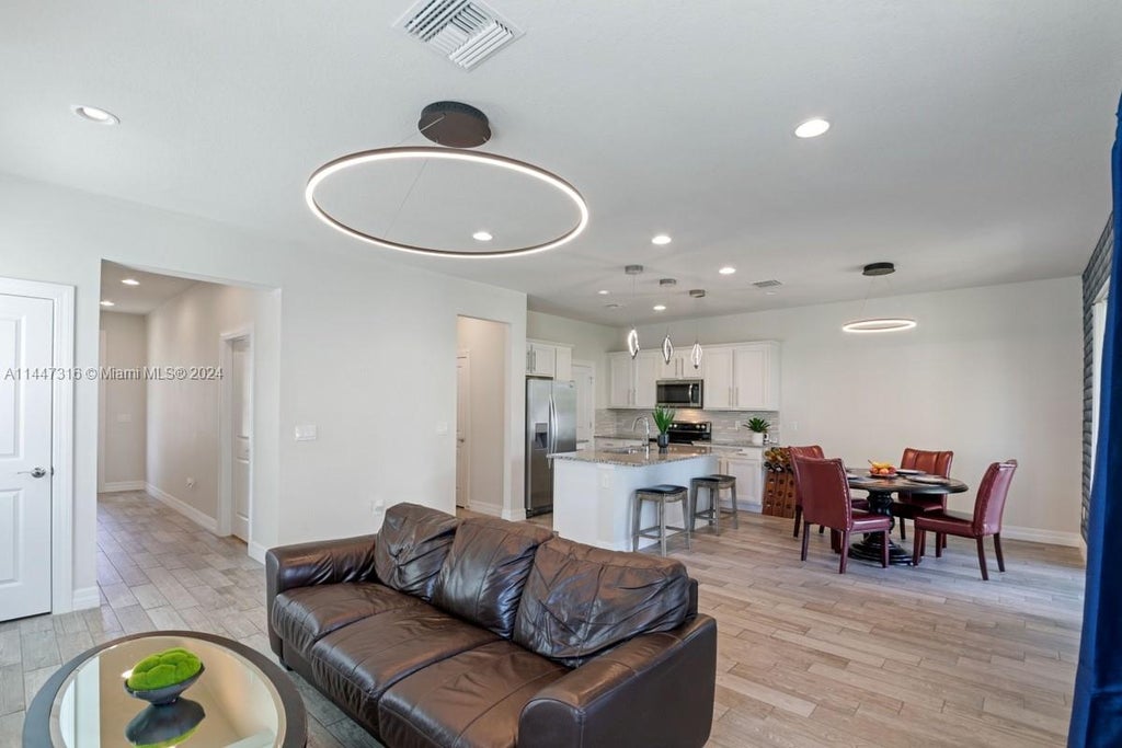 Photo of 4111 Large Leaf Ln, Hollywood, FL 33021 (MLS # A11447316)