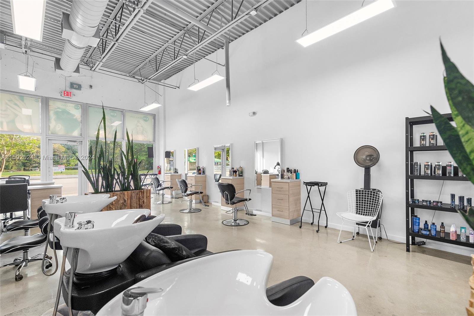 Prime Salon Opportunity in Bustling Shopping Center,Discover an exceptional chance to own a thriving hair salon in the vibrant Koosh at Griffin Shopping Center. This established salon attracts a steady stream of walk-in clients from nearby residential neighborhoods and businesses. Fully equipped and ready for immediate operation, it features a chic interior design and a welcoming atmosphere. With a loyal customer base and room for growth, ample parking, and neighboring businesses like Dollar Tree, AT&T, interior design services, and a popular coffee shop, this is a golden opportunity for beauty industry entrepreneurs to own a successful business in a thriving area. Please be respectful of the current management and contact your agent or the listing for viewings.
