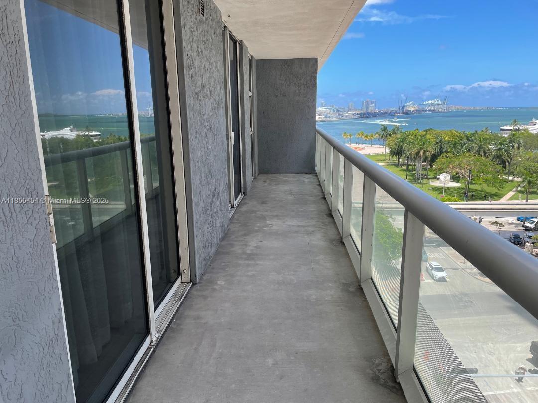 Live in the heart of Downtown Miami with stunning partial bay views at 50 Biscayne! This modern unit features a split floorplan, sleek tile floors throughout, top of the line finishes, and well sized closets for all your storage needs. Enjoy luxury living with 5-star amenities: a state-of-the-art gym overlooking the bay, resort-style pool with cabanas, full spa with steam room & sauna, party room, and more. Unbeatable location across from Bayfront Park—steps to Bayside, Kaseya Center, Whole Foods, Silverspot Cinema, Brightline, People Mover, and Brickell City Centre. Rent includes 1 parking space, water, cable, and internet.