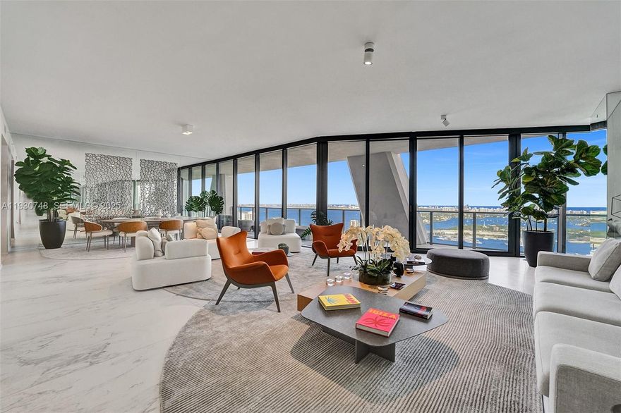 Welcome to the home of your dreams at One Thousand Museum, the iconic residential masterpiece designed by world-renowned architect Zaha Hadid. This expansive 4-bedroom, 5.5-bathroom corner residence offers a rare flow-through layout and is fully furnished by Artefacto, blending timeless elegance with contemporary sophistication.

Enjoy breathtaking intracoastal and Biscayne Bay views from every room, with endless sunrises and sunsets that frame the Miami skyline and waterfront. Spanning approximately 4,600 square feet, this residence delivers an exceptional sense of scale, light, and privacy, making it ideal for both everyday living and grand entertaining. The thoughtfully designed layout provides seamless transitions between formal and informal living spaces, while floor-to-ceiling windows flood the home with natural light.

The residence has been impeccably maintained and reflects the highest standards of luxury living. The gourmet kitchen is equipped with top-of-the-line Gaggenau and Sub-Zero appliances, custom cabinetry, and premium finishes, complemented by a state-of-the-art home automation system.

Additional features include four parking spaces, a private storage unit, and a dedicated vault, offering both convenience and enhanced security—rare and highly desirable amenities in a residence of this caliber.

This is a rare opportunity to own a truly iconic home within one of Miami’s most celebrated architectural landmarks.