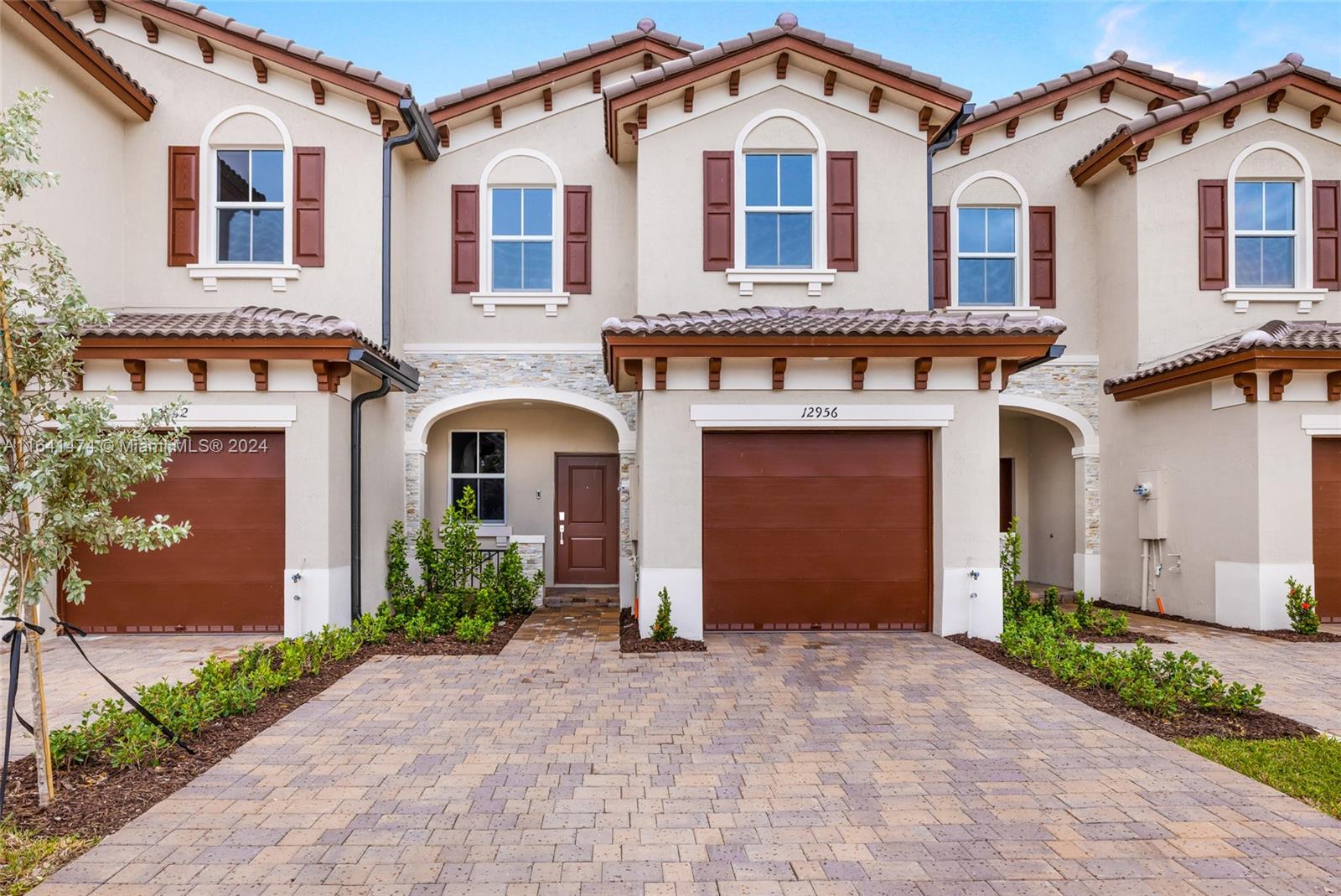 Brand New townhouse with lake view in the heart of Miami, where nearly everything is within a distance of your residence, 3 bedrooms 2 1/2 bathrooms with quartz kitchen countertop, stainless steel appliances, tile first floor, carpet second floor, and 1 car garage. Close to shops, 15 minutes from the Miami International Airport, 30 minutes from Brickell, Downtown Miami, 25 from the beach, Aventura, expressways, and more. Only 2 Months for the move!
