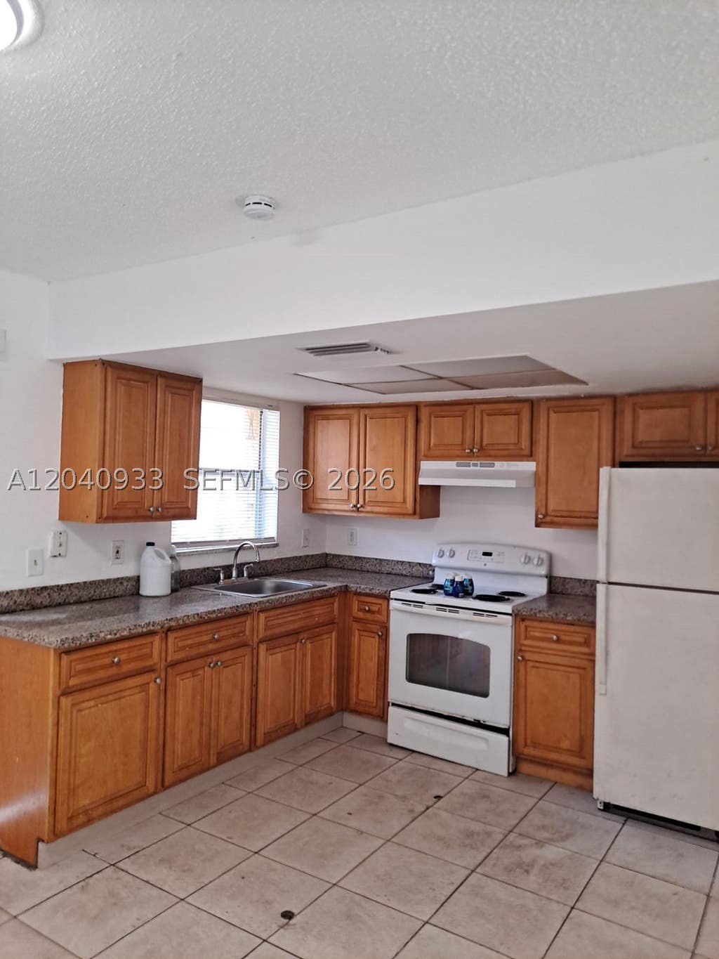 Photo of 2560 NW 52nd Ave #C18, Lauderhill, FL 33313 (MLS # A12040933)