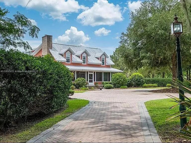 The lamp-lined driveway through the pecan orchard gives a peaceful feeling as you enter this beautiful 67-acre private, gated estate. The natural environment & abundant amenities provides an outstanding setting for a relaxed & enjoyable lifestyle. The graceful centerpiece of this property is a 6675 sq ft, 7 bedroom/5.5 bath home with a choice of owner’s suites. Downstairs, the suite offers a graciously spacious bedroom & bath with 2 WC’s, separate shower & large soaking tub with bay window to view creek & nearby pond. The suite features custom cherry cabinetry providing ample storage in bath & 2 large walk-in closets. A cozy sitting area with gas fireplace overlooks landscaped pond. Upstairs, the suite area includes a large bedroom & bay window sitting area