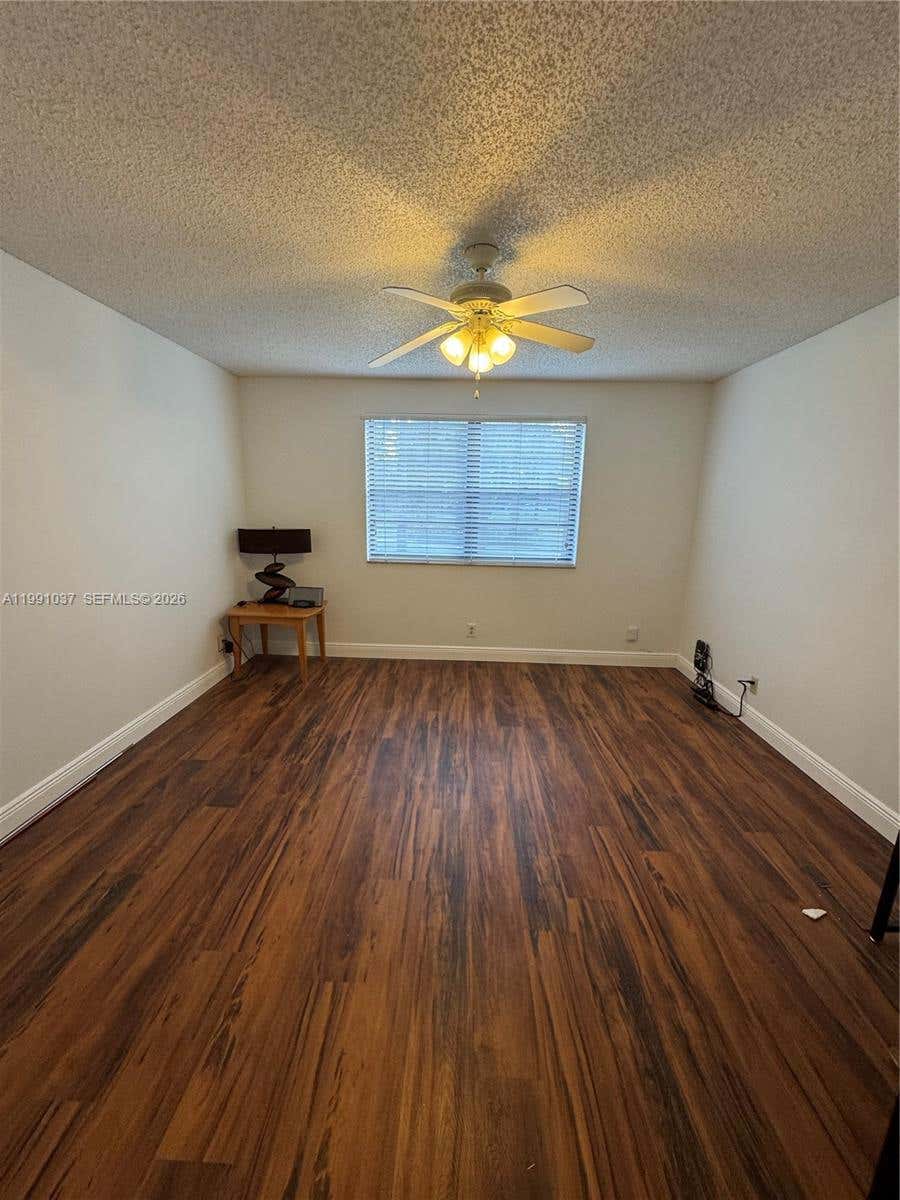 Photo of 6095 N Sabal Palm Blvd #104, Tamarac, FL 33319 (MLS # A11991037)