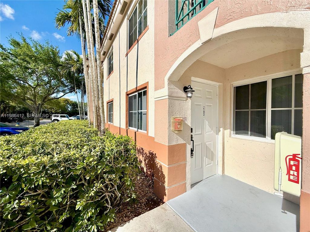 Photo of 2251 NW 77th Way #102, Pembroke Pines, FL 33024 (MLS # A11986412)
