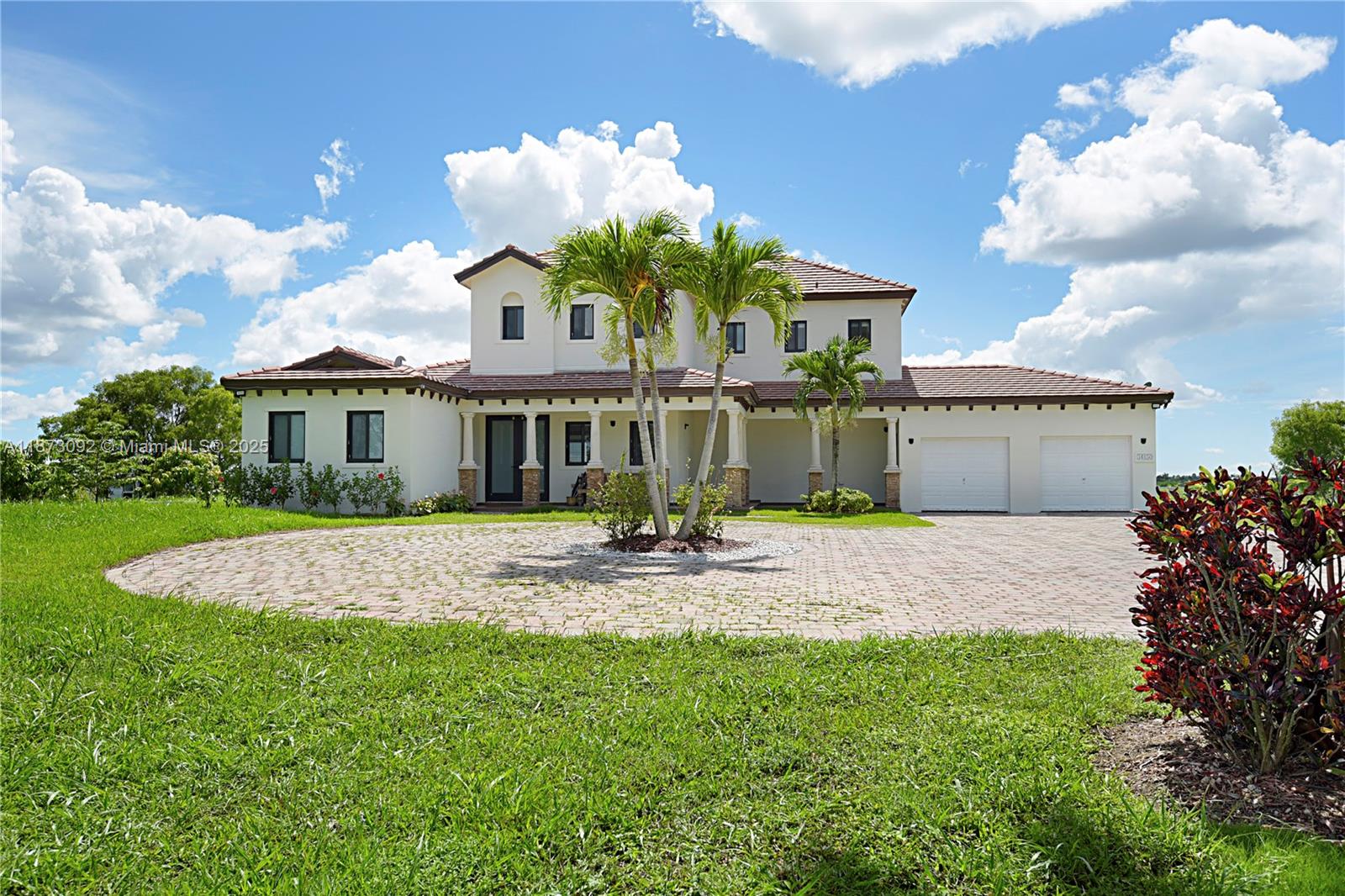 This renovated 4-bedroom, 4.5-bath estate sits on 4.4 acres of expansive land, offering privacy and tranquility. Inside, the home features upgraded countertops, stainless steel appliances, custom wood cabinetry, and a 2-car garage. Outdoors, enjoy a new pool, spacious gathering area, full outdoor bathroom, and a serene pond. The property is enhanced with a variety of fruit trees (Avocado, mango, longan, starfruit, mamey, sapodilla, cherry, sugar apple, lychee, coffee fruit), providing year-round harvests. Close enough to the city for convenience yet far enough to feel like a true escape, this home blends modern comfort with peaceful countryside living.