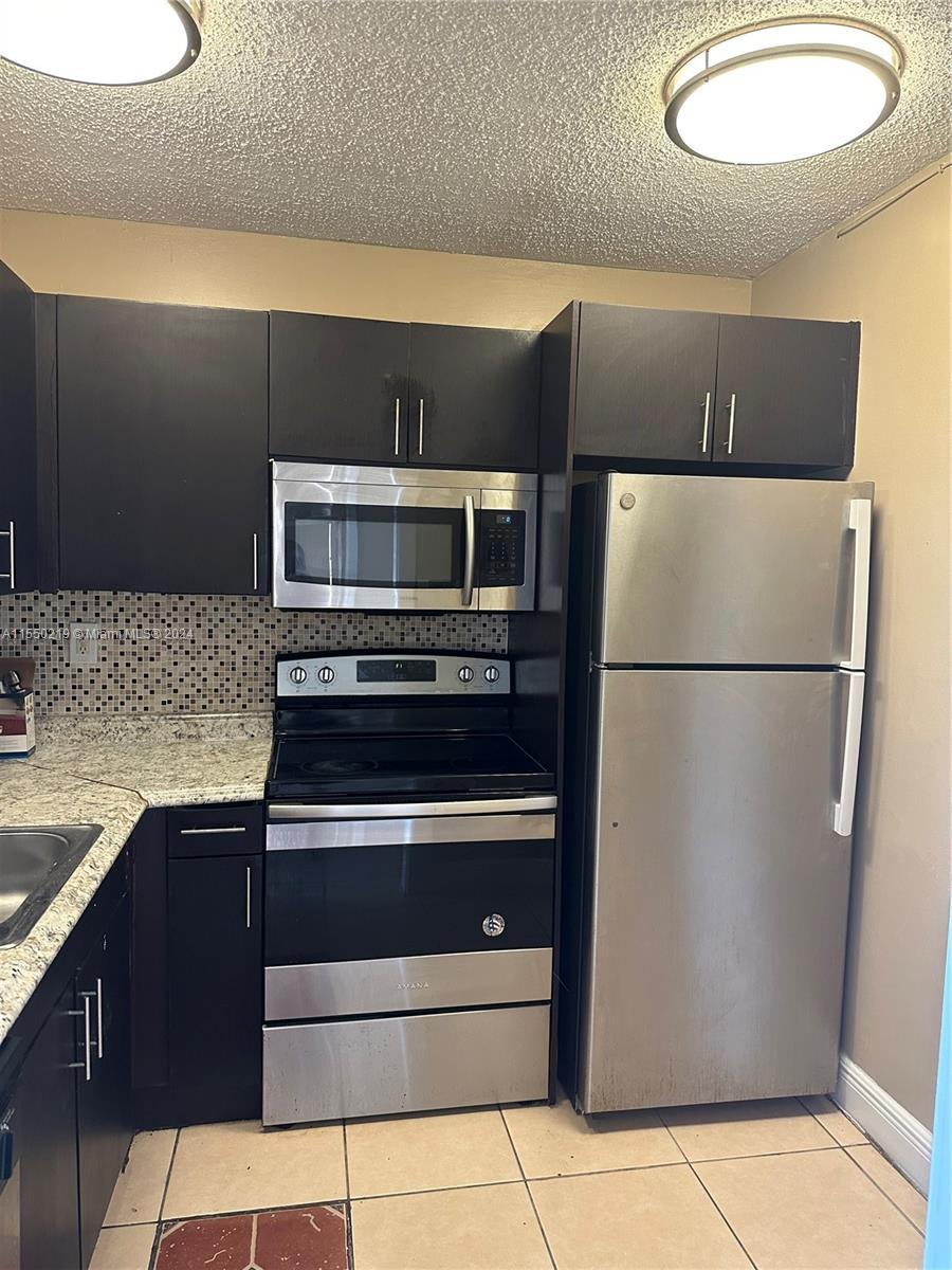 Beautiful 2/2, title floors, very close to 95 and beaches, great location.  Gated Community with 24 hrs Security. pool and other amenities.