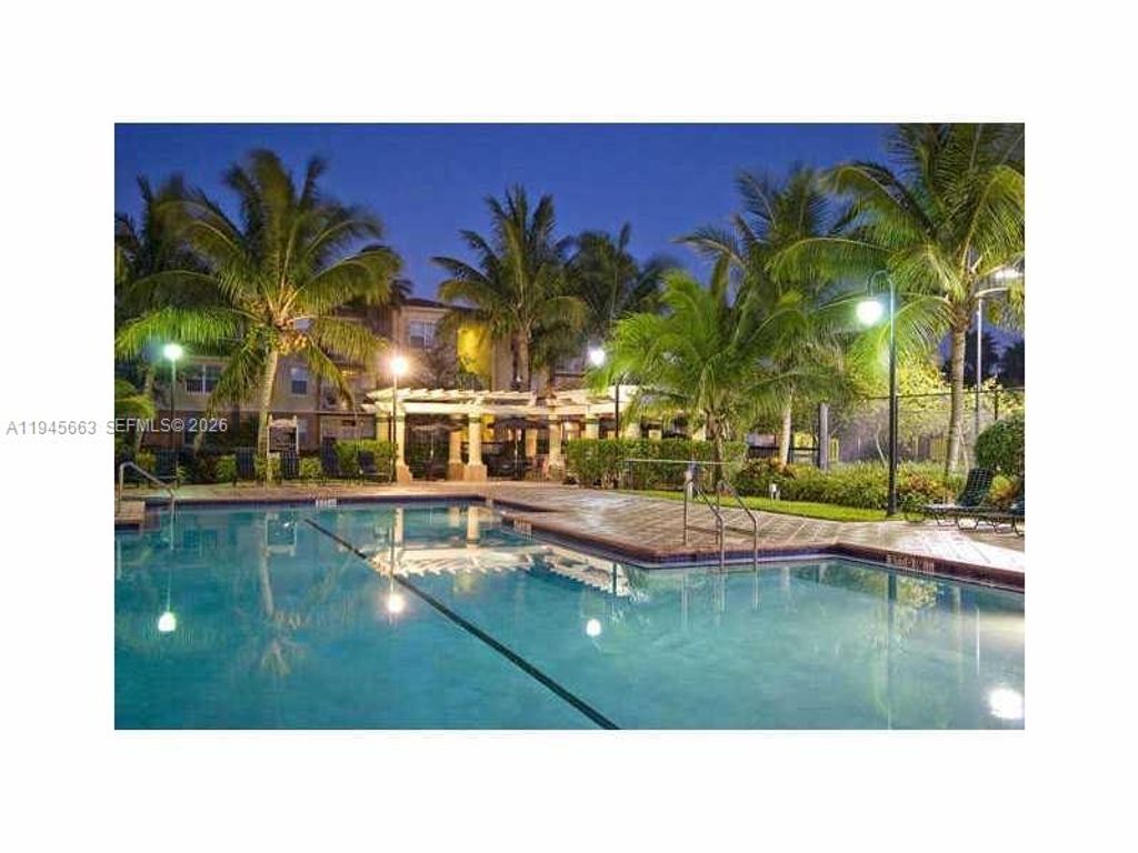 Photo of 2589 Centergate Dr #202, Miramar, FL 33025 (MLS # A11945663)