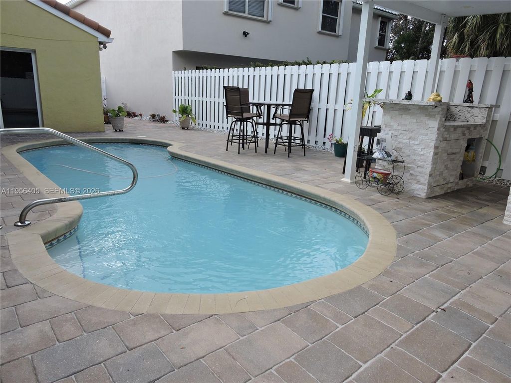 Photo of 10575 SW 12th Mnr, Pembroke Pines, FL 33025 (MLS # A11956405)