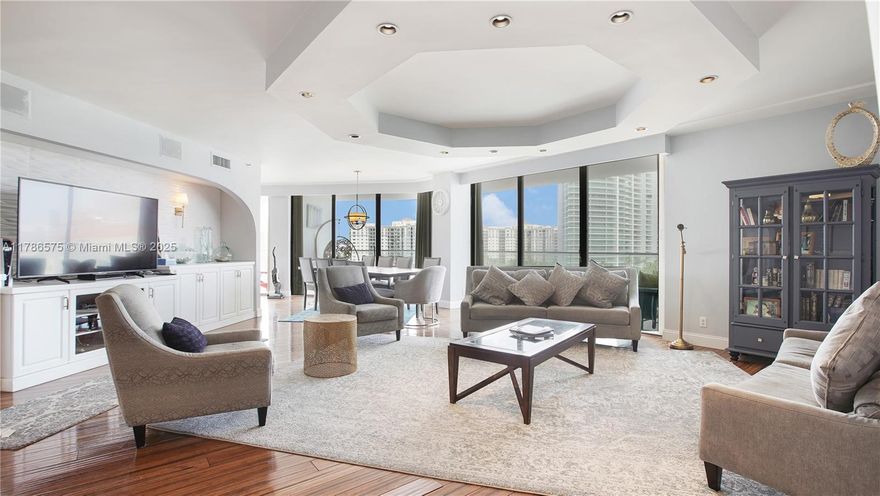 Experience luxury living with stunning panoramic views from this rare double unit (A-B) on the 10th floor of Turnberry Isle in Aventura. Overlooking the ocean, Intracoastal, and marina, this spacious residence features newly refinished hardwood floors, updated kitchen and baths, and elegant custom ceilings—just waiting for your personal touch. Enjoy world-class amenities including a marina, pool, tennis courts, entertainment rooms, and valet service. Ideally located near Aventura Mall and within walking distance to houses of worship, this is an exceptional opportunity in one of South Florida’s most desirable communities.