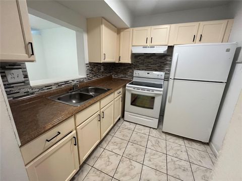 Photo of 3710 NW 21st St #211, Lauderdale Lakes, FL 33311 (MLS # A11977131)