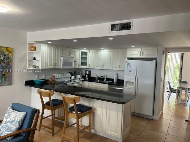 425 GRAPETREE DR 209