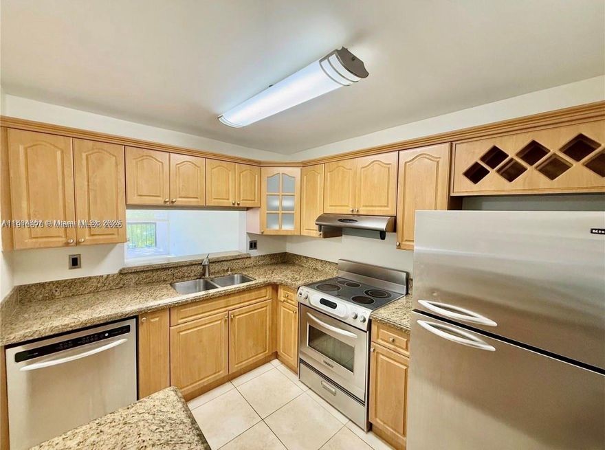 Spacious two-bedroom, two-bathroom corner unit located on the third floor. The unit is situated adjacent to Miami-Dade College and the Community Center. It features tile floors, a storage closet on the balcony, and amenities such as a community with security gates, guards, a pool, a tennis court, and laundry facilities on each floor. The unit is conveniently located near expressways and shopping centers.
