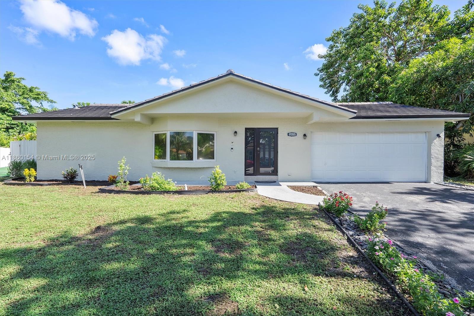 Beautifully renovated one-story home with 3 Bedrooms, 2 Bathrooms, pool, and no HOA! This home features brand new luxury vinyl floors, an updated open kitchen with granite countertops and stainless steel appliances, and updated bathrooms. Spacious living room and common areas. Primary bedroom with walk-in closet. Part of the Florida room is enclosed as a extra room, currently used as a 4th bedroom. Oversized backyard with a pool, covered wood deck, and a large lanai is perfect for entertaining. 2 car garage plus a large driveway to fit up to 5 cars and new garage door opener 2025. Impact Windows and Doors. Roof 2023. AC 2025. Water Heater 2020. Pool was resurfaced in 2021. READY TO MOVE IN! Mortgage savings may be available for buyers of this listing.