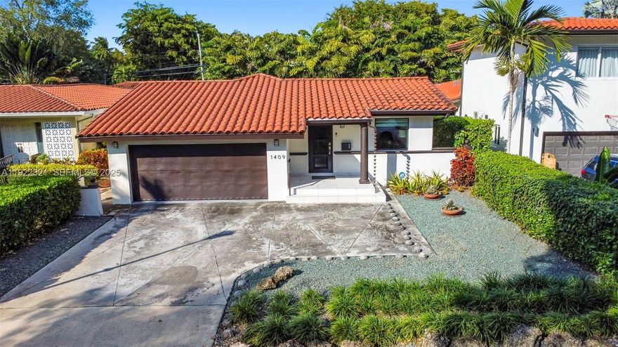 Beautifully remodeled 3-bed, 2-bath home in the heart of Coral Gables! This charming residence offers 1,650 sq ft of bright, comfortable living with refurbished wood floors, a remodeled kitchen with modern finishes, and updated bathrooms done with great taste. The spacious living and dining areas flow seamlessly, creating an ideal layout for everyday living and entertaining.

Impact windows throughout provide peace of mind, while the remodeled garage offers improved functionality, storage, and versatility. A two-car garage with electric car charger already installed plus driveway parking for at least two more vehicles adds excellent convenience. Window treatments are installed throughout the home.

Step outside to a private backyard with plenty of room to relax, garden, or personalize as your outdoor oasis. Situated on a 6,000 sq ft lot, this property is located just minutes from the best of Coral Gables—shops, dining, parks, and top-rated schools.

This move-in-ready home blends timeless Gables charm with thoughtful updates, offering comfort, style, and an unbeatable location.