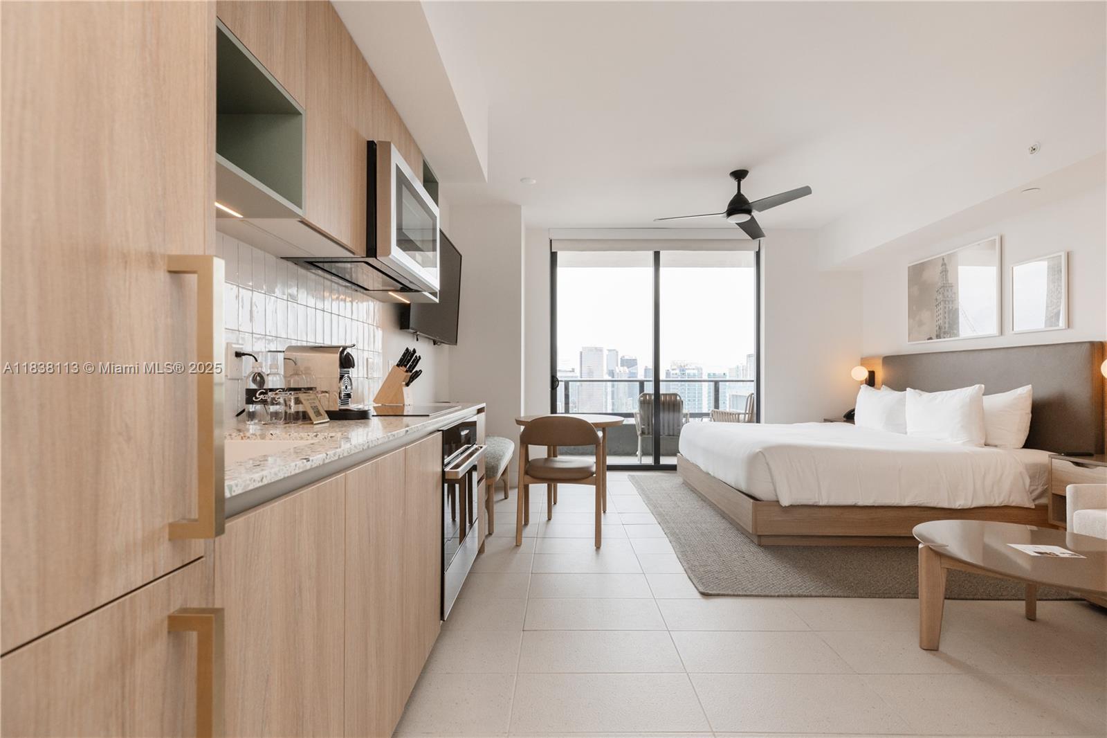 Please enjoy a stunning fully furnished studio in the luxurious Miami's newest building in the heart of Downtown. Income producing condo is currently under hotel program. Condo is located on the 36th floor provides a full breathtaking views of the Atlantic Ocean, Miami Skyline and Biscayne Bay. Modern studio boasts high-end finishes, king size bed. There are luxurious amenities offering pool, gym, 24/7 concierge services, electric vehicle charging stations, state-of-art smart building technology, full service lobby, a cocktail bar and restaurant. Internet, cable, washer and dryer are included.