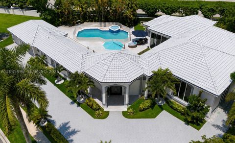 Photo of 2673 NW 64th Blvd, Boca Raton, FL 33496 (MLS # A12035996)