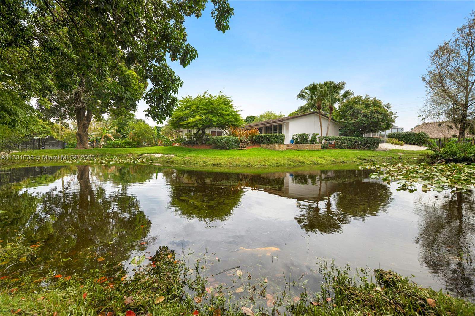Beautiful, private oasis in sought after Southwest Ranches an Equestrian Community.. Completely remodeled home on an acre, 2019 roof, gorgeous lagoon style salt water, wifi controlled pool/jacuzzi, 1,400sq ft screened in patio.Home features updated kitchen & baths, large Master bedroom w/ French doors leading directly to pool, cabana bath, oversized bedroom w/ En Suite, accordion hurricane shutters. No HOA. Oversize Electric gate with fenced property,New Generac electric 30KW generator, 2 car Quonzet garage. Large Tiki Hut. Summer Kitchen, barbecue, New electric panel, new dishwasher, oven/stove, solid wood cabinets. Pelican water system no need to add salt ever again. Lagoon w/ koi, turtles and other aquatic life. Horses permitted. Come live the life you dreamed of.A must see home