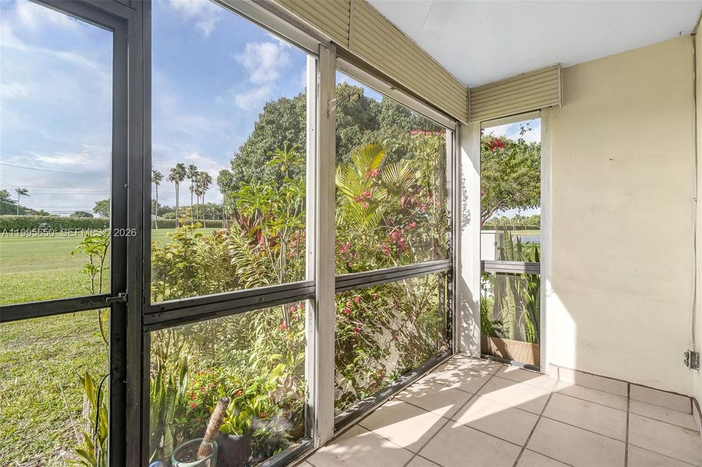 Photo of 9820 S Hollybrook Lake Dr #106, Pembroke Pines, FL 33025 (MLS # A11995650)