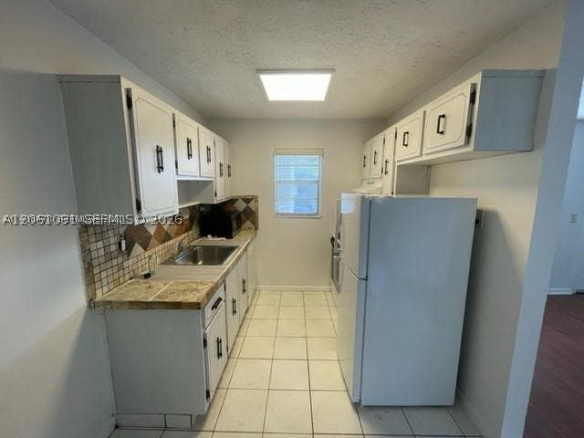 Photo of 30 SE 4th Ave #214, Hallandale Beach, FL 33009 (MLS # A12061091)