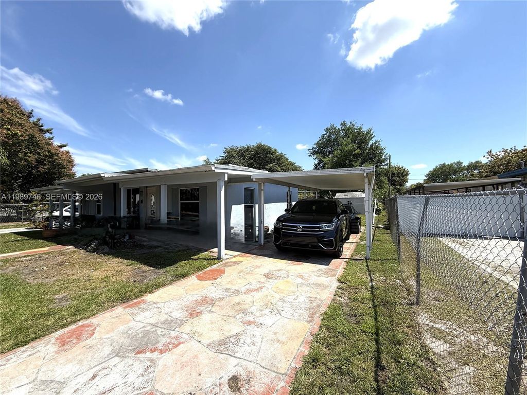 Photo of 9615 NW 26th Ave, Miami, FL 33147 (MLS # A11989746)