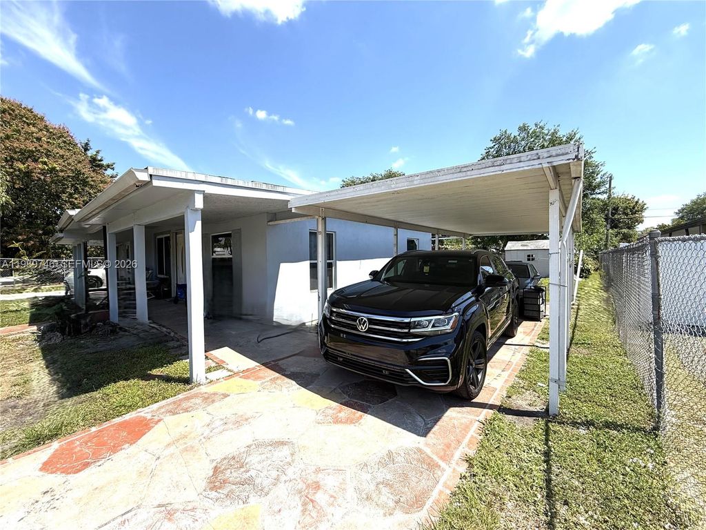 Photo of 9615 NW 26th Ave, Miami, FL 33147 (MLS # A11989746)