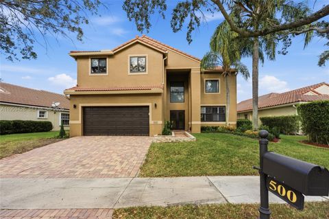 Photo of 500 Cambridge Dr, Weston, FL 33326 (MLS # A11959426)