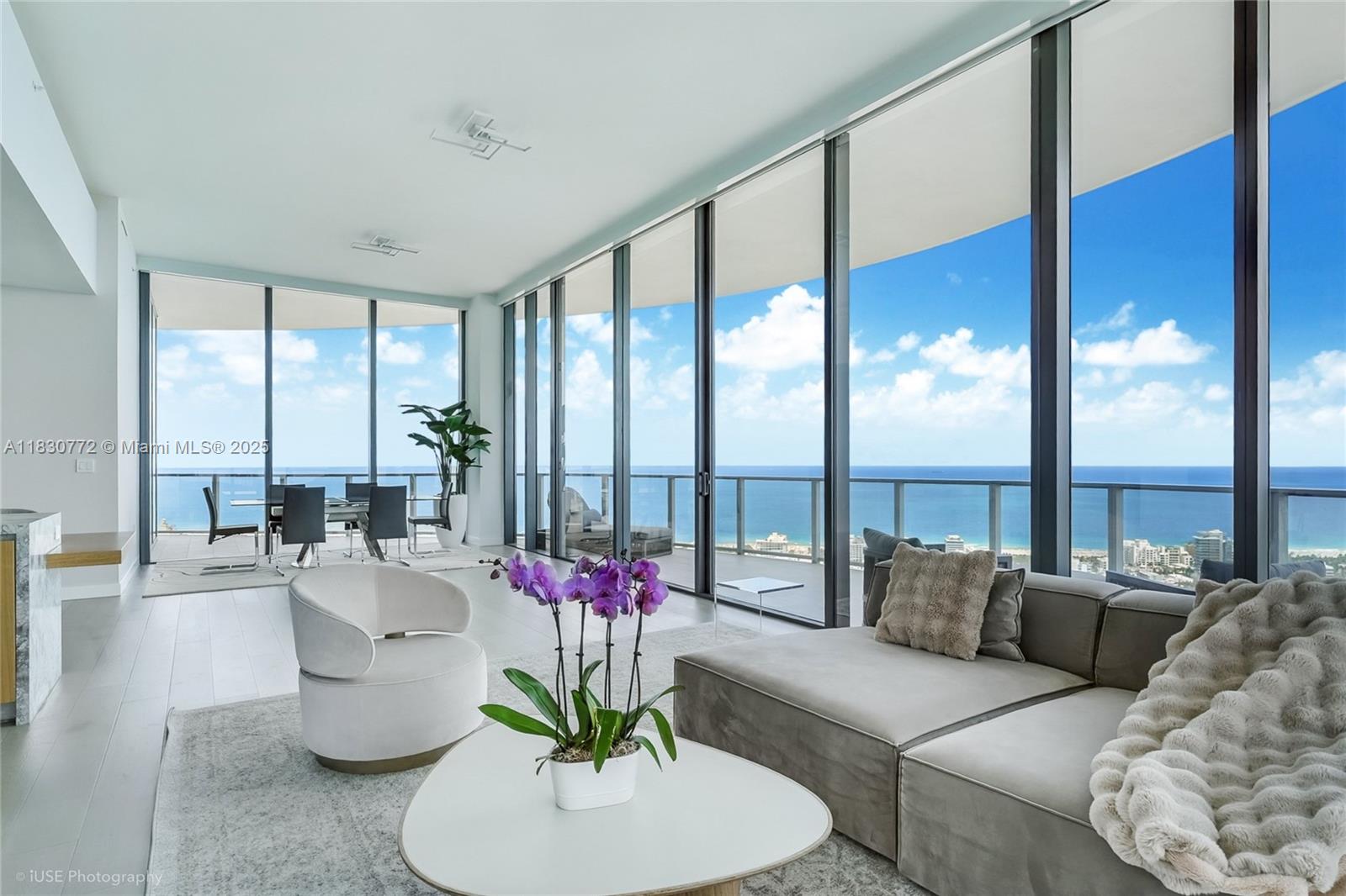 An ultra-exclusive corner residence at Five Park with 3,200 SF interior + 1,100 SF wraparound terrace. Breathtaking 180° views of the ocean, Miami skyline, South of Fifth & Fisher Island. High-floor unit just below the penthouses with 11'+ ceilings and floor-to-ceiling windows. Upgrades include Apple Smart Home system, custom closets, electric blinds, and renovated primary bath. Currently being reconfigured from 4 beds to 3, with a fully redesigned and expanded kitchen that enhances flow and opens up even more skyline views. Renderings attached. As part of the exclusive Canopy Collection residents enjoy access to private 26th-floor Canopy Club, 2 pools, gym, spa, beach club, restaurant & more—steps from South of Fifth in Miami Beach’s newest iconic tower.