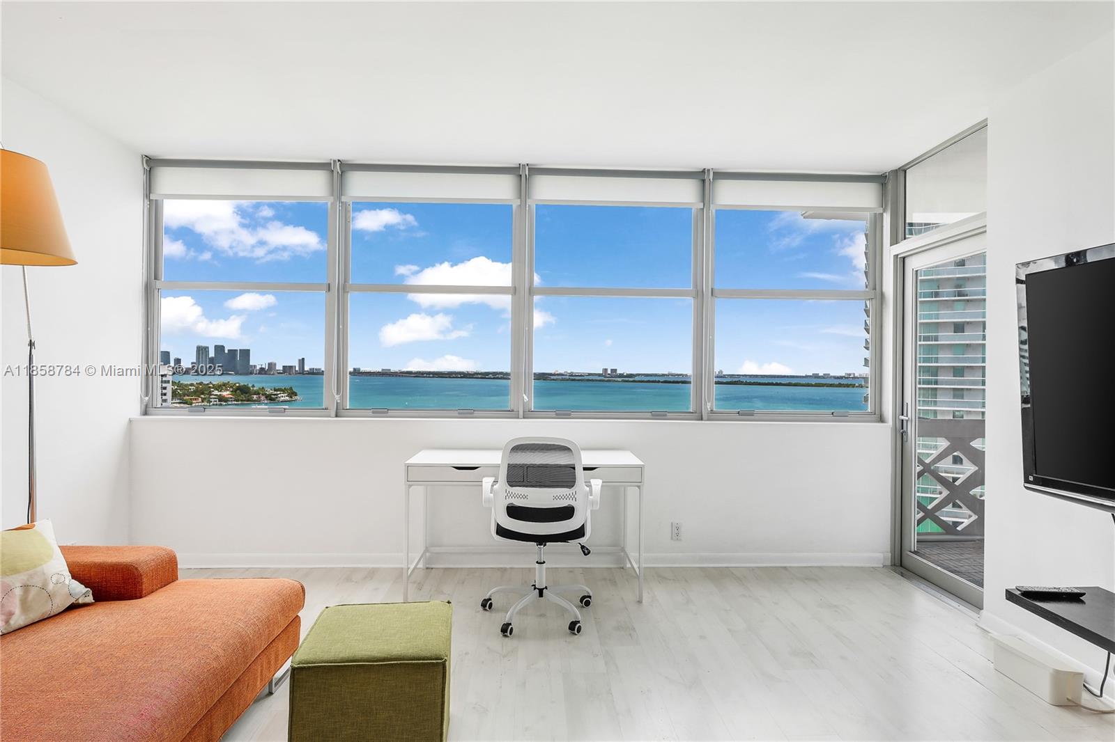 Oversize one bedroom residence + 1.5 baths with prime waterfront views of the Bay of Biscayne at MIMO Iconic Belle Plaza in Miami Beach. Remodeled open kitchen and new hurricane impact windows and terrace door. Assigned parking space and full amenities including tennis court, heated pool overlooking the bay, gym and BBQ area. Centrally located on Belle Isle, at walking distance to the Standard Hotel, Sunset Harbor shops and Lincoln Road.