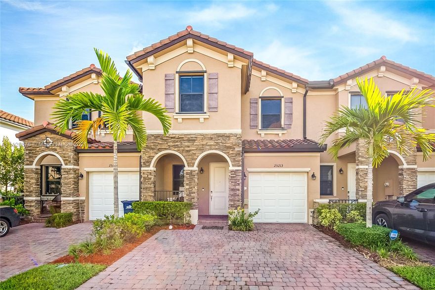 Beautiful Townhome in the sought after community Artesa. Spacious 3 bedroom, 2.5 bathroom features gourmet kitchen, granite countertops with stainless steel appliances, beautiful dark wood kitchen cabinets, 1 car garage, tile floors on first floor, brand new wood floors on second floor, eat in kitchen with dining room overlooking a gorgeous patio with pergola for outdoor seating. Newly landscaped backyard with wood fence, spacious master bedroom, laundry room on second floor. The community offers several amenities, clubhouse, pool, gym, landscaping front yard, security gate and patrol. This townhome is in new condition very well taken care of. Call listing agent for showing instructions.