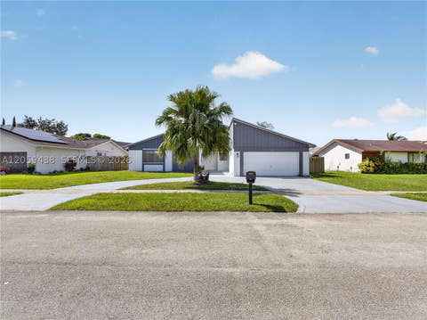Photo of 9428 NW 46th Ct, Sunrise, FL 33351 (MLS # A12059438)