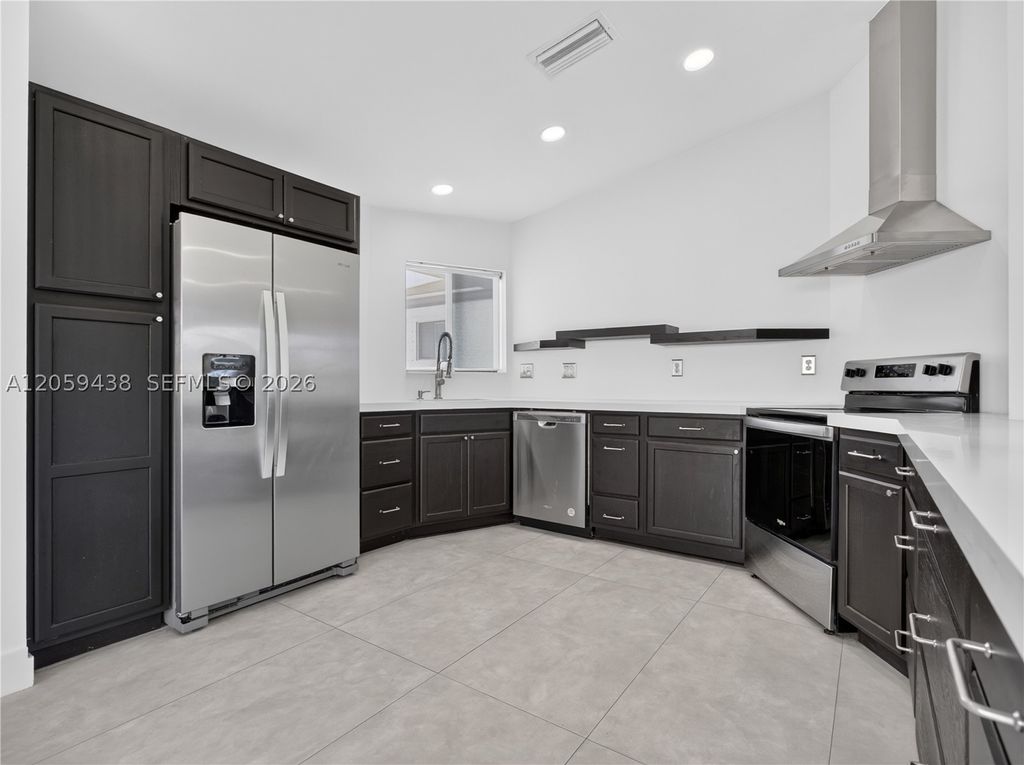 Photo of 9428 NW 46th Ct, Sunrise, FL 33351 (MLS # A12059438)