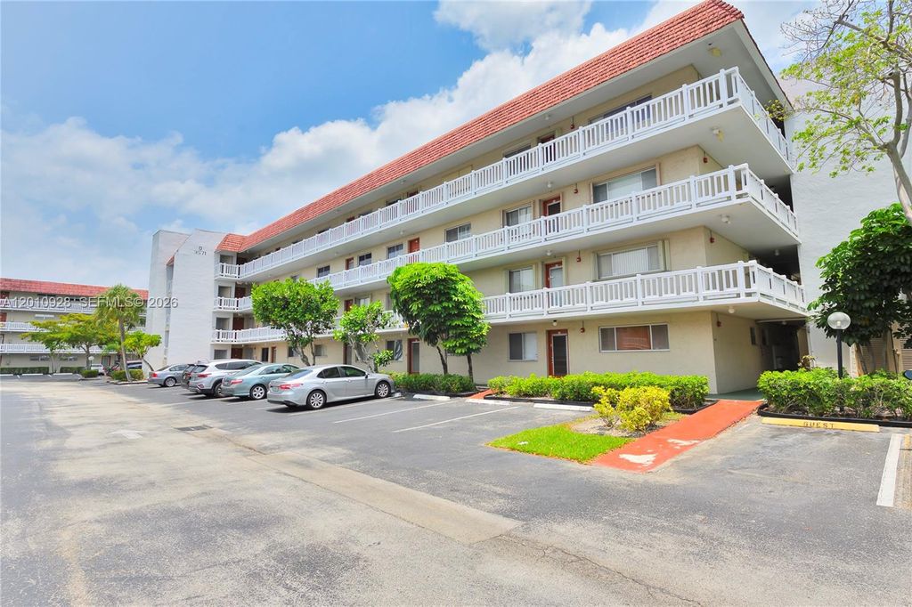 Photo of 3571 Inverrary Dr #202, Lauderhill, FL 33319 (MLS # A12010928)